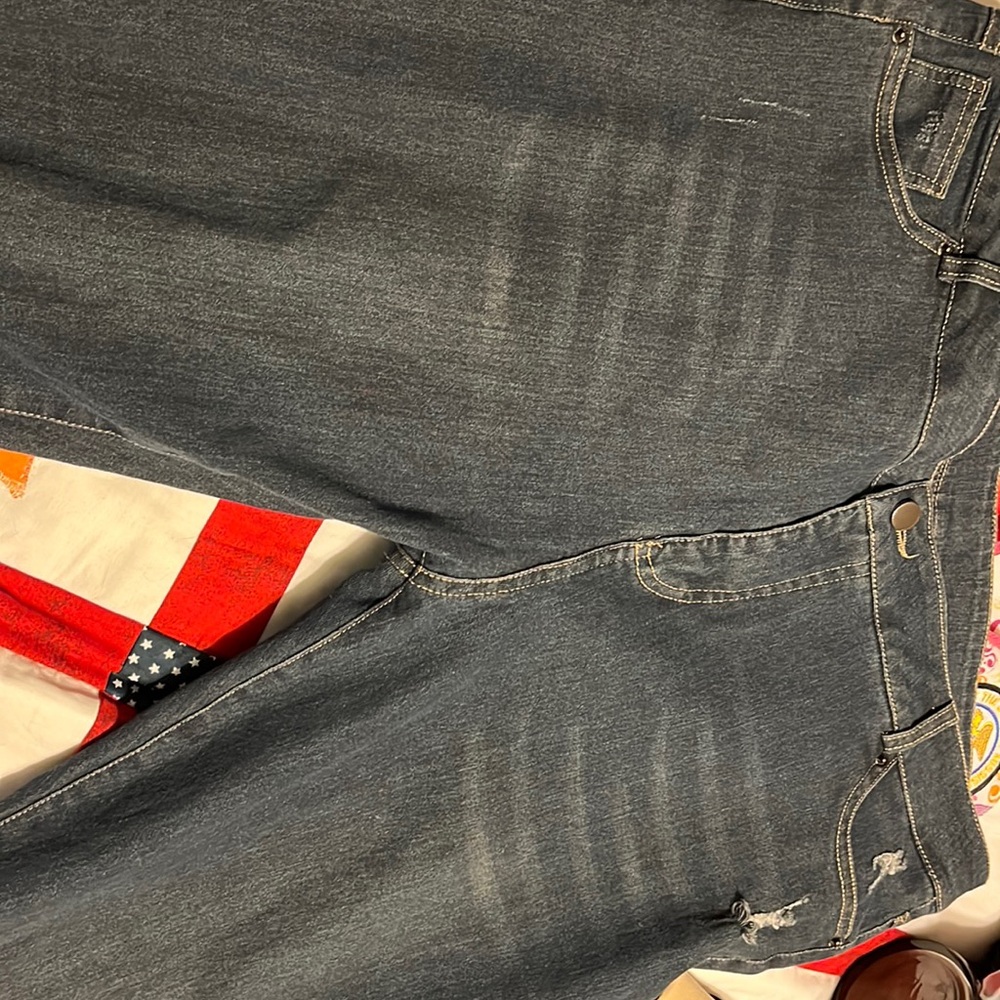 A pair of blue jeans not sure the size maybe a 14